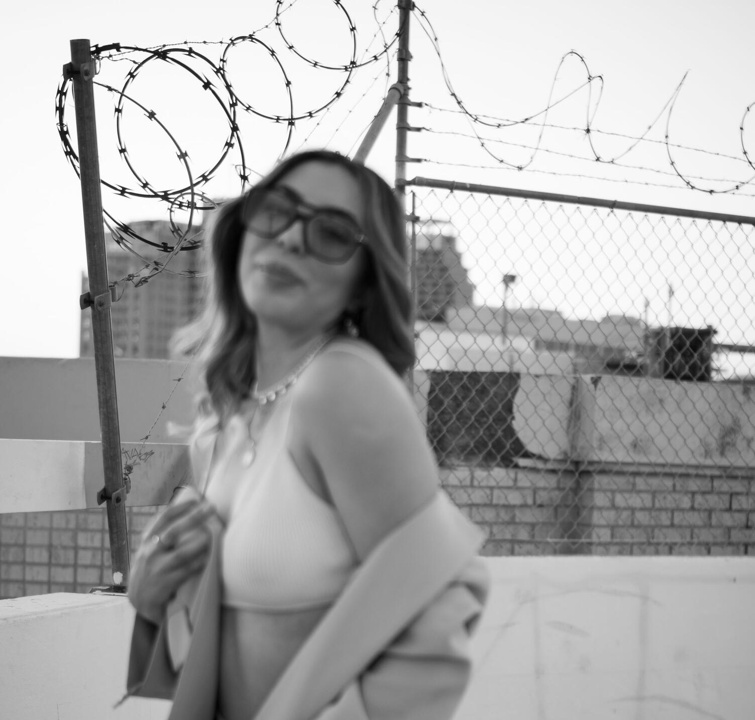 Black and White Film to create a hard edge. Giving the campaign form and confidence.